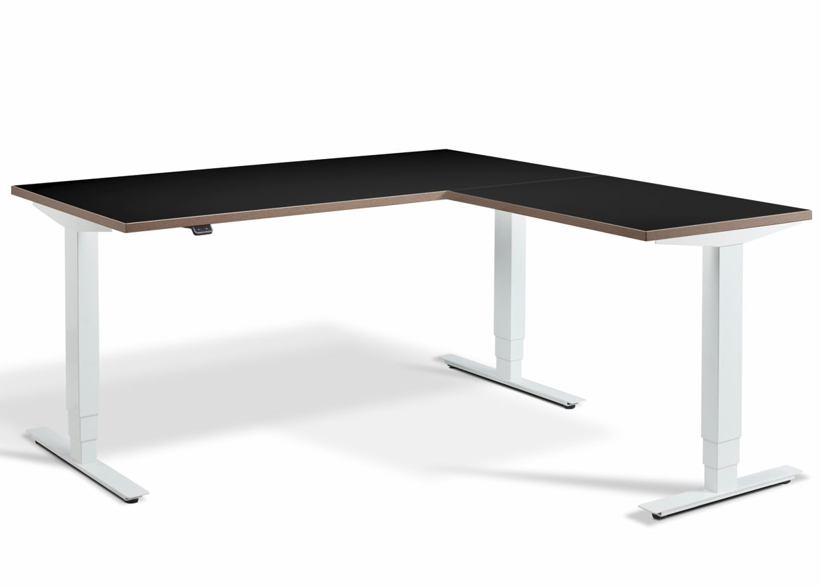 Advance Sit Stand Corner Desk shown with white frame and black top with ply edge