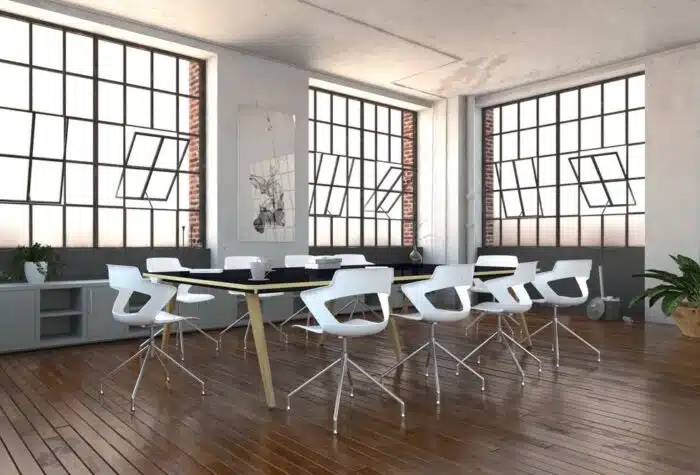 Aria Chair shown in a meeting room with a Vega wood conference table