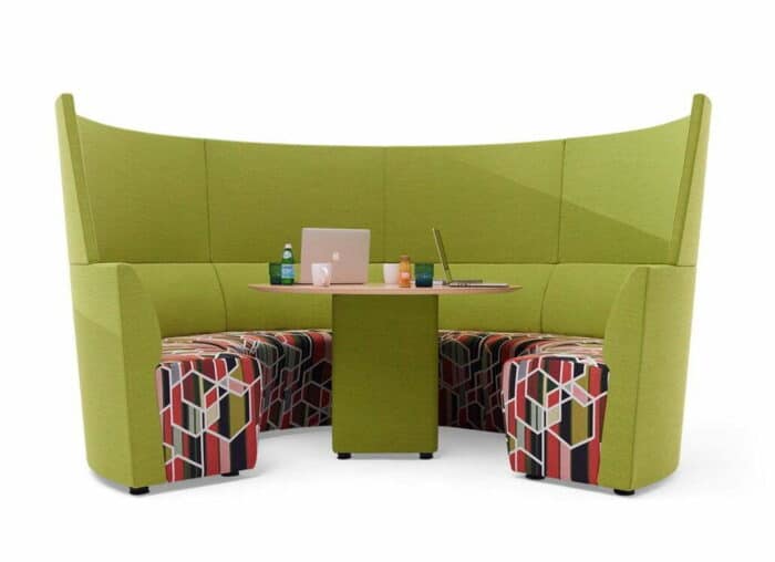 Away From The Desk Soft Seating curved seating configuration with table in green upholstery