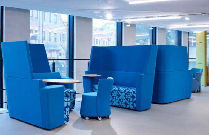 Away From The Desk Soft Seating twp bacl to back 1800mm straight seat, back & screen units shown with chairs and a table