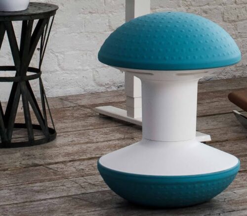 Ballo Stool shown with a blue finish in a workspace