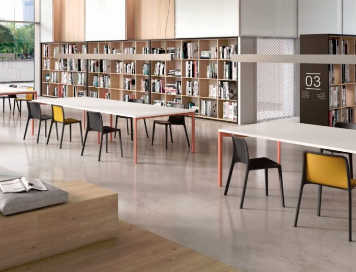 Bika Chair group of chairs shown with Hexa Tables in a reading area