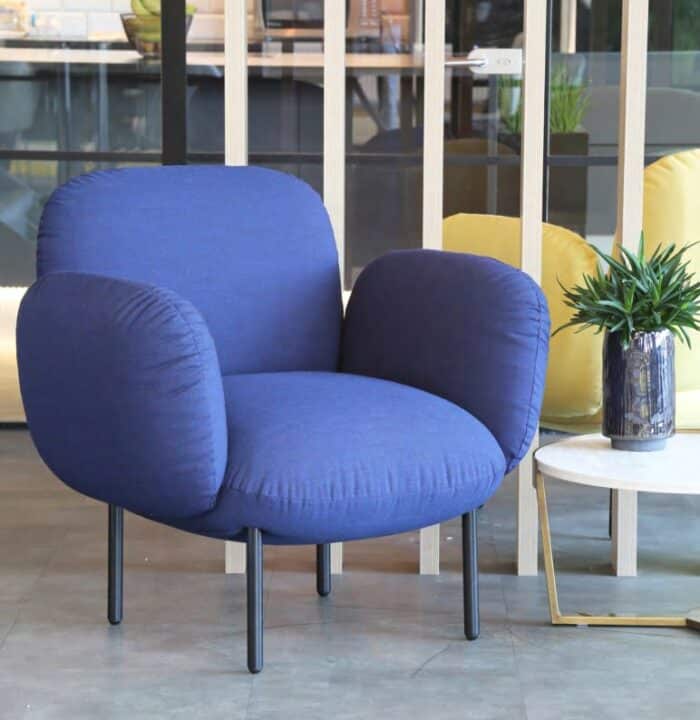 Boho Chair pair of chairs with blue and yellow upholstery shown in a breakout area
