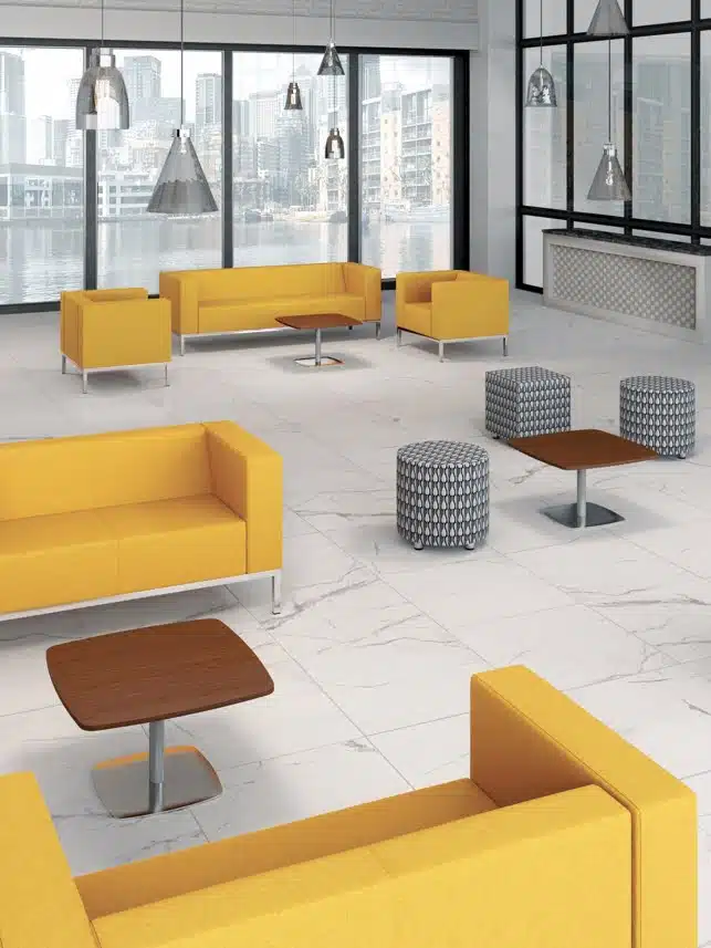 Box Soft Seating group of sofas, chairs and stools with yellow upholstery in a breakout space