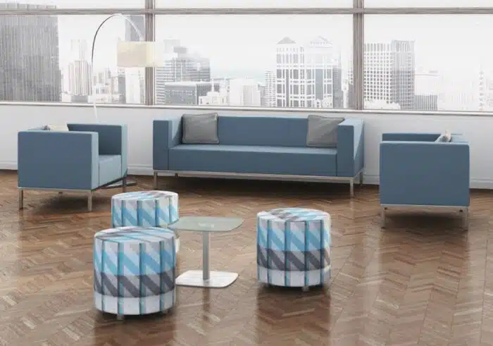 Box Soft Seating two single seaters and a three seat sofa wth blue upholstery shown with Box Stools and a coffee table