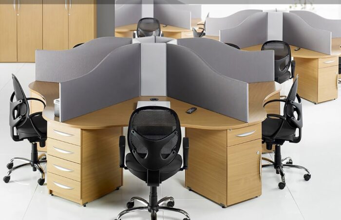 Circular Call Centre Desks three 6 person configurations with grey desk screens and pedestals shown in an office space