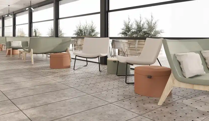Cortado Seating - metal leg chairs and wood leg benches shown in a breakout space with coffee tables and upholstered stools