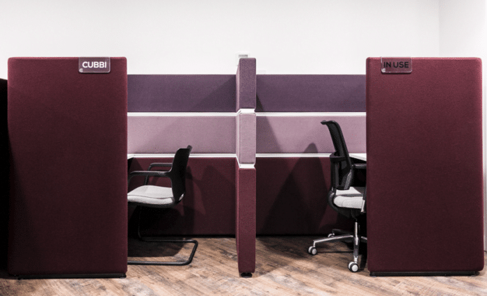 Cubbi Acoustic Enclosure two single booths with task chairs in maroon upholstery