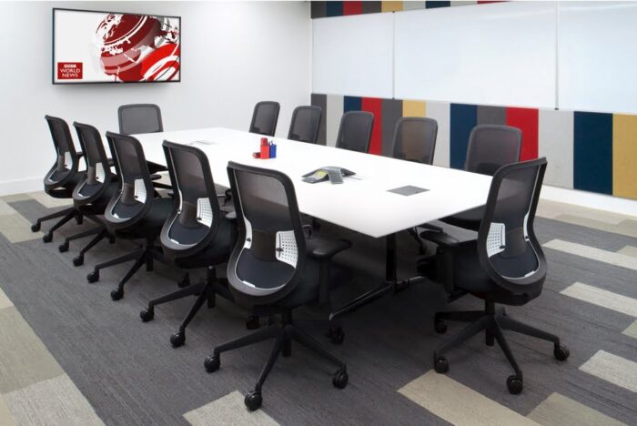 Do Mesh Task Chair 12 chairs with arms and black frames and bases in a meeting room