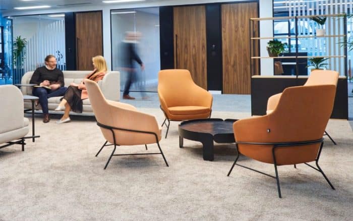 Drive Soft Seating chairs with 4-leg metal frame shown in a lounge space