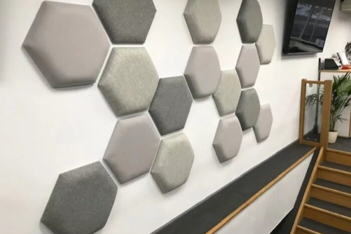 Eden Acoustic Tiles hexagonal tiles on a wall by a staircase