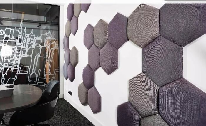 Eden Acoustic Tiles hexagonal tiles shown wall mounted in an office