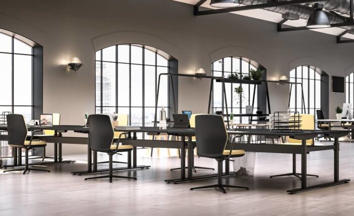 Era Work Lite Chair group of chairs with arms and upholstered backs around a bench desk