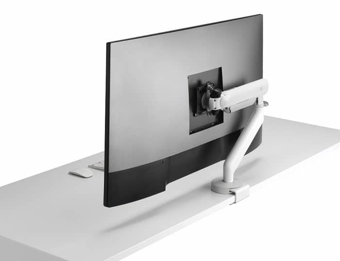 Flo X Monitor Arm - rear view of a single arm in white shown with clamped to a desk