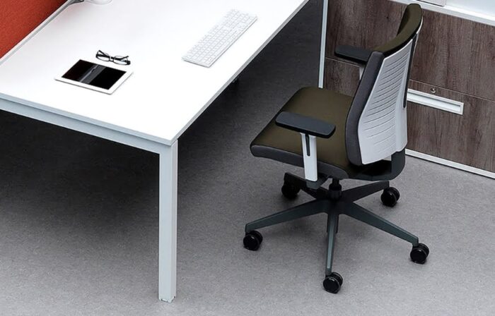Freeflex Task Chair with height adjustable arms shown in front of a desk