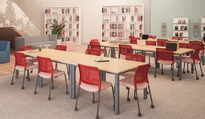 Grafton Chair red chairs on castors shown in a library