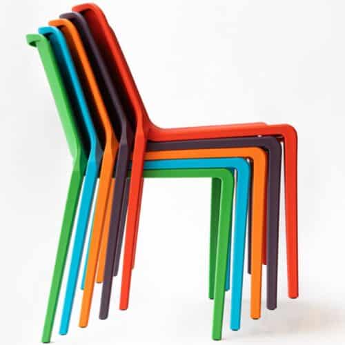 Hatton Chairs Showing A Stack Of Five Chairs In Bright Colours