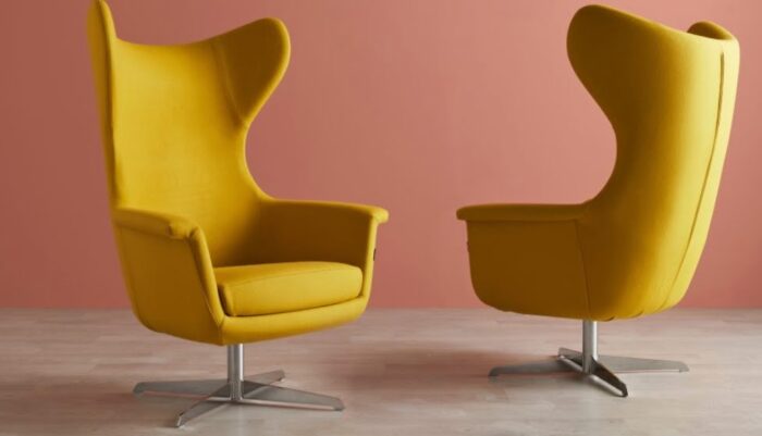 Hecta Soft Seating pair of high back chairs with 4 star metal swivel bases in yellow upholstery