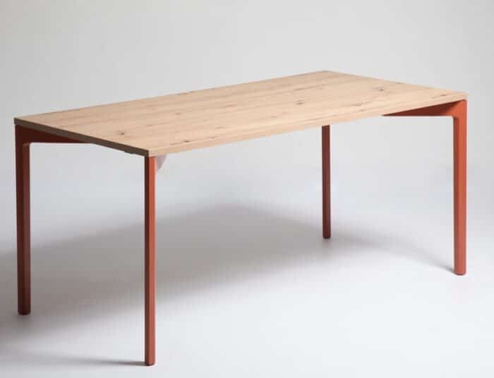 Hexa Table rectangular table shown with terracotta 4 leg frame