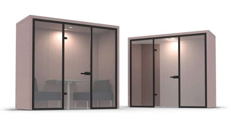 Hyde Booth 2-person booth with glass fronts, one shown with a table and soft seating units, the other shown empty for users own furniture