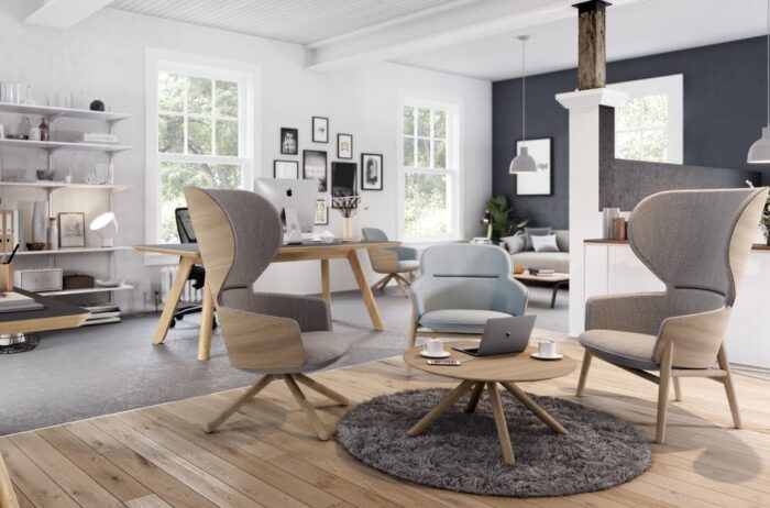 Hygge Soft Seating two high back and one low back broomstick base chairs with the omni table in an office