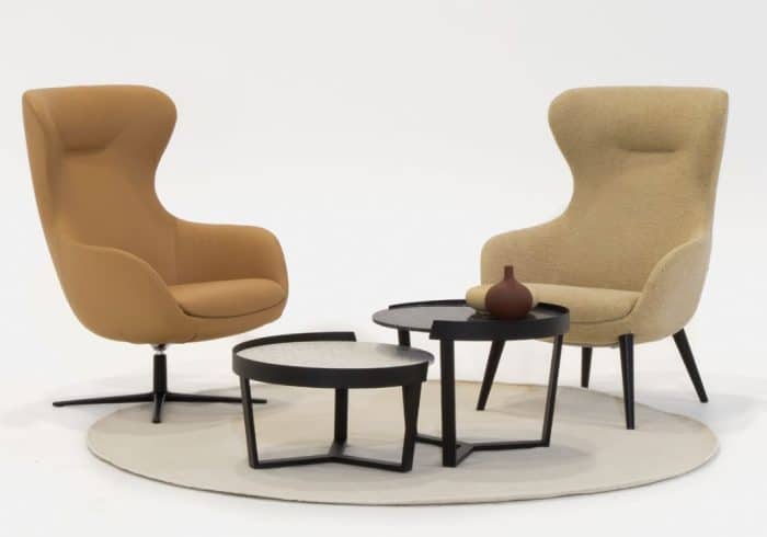 Ilk Soft Seating - two high back chairs - on with a 4 star swivel base and one with a 4 leg wood frame shown with an Margin coffee tables