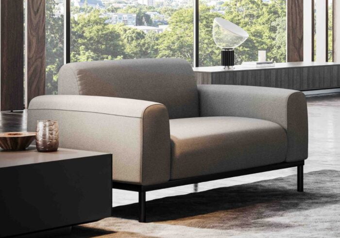 Ionic Soft Seating single seater with black frame shown in a lounge space