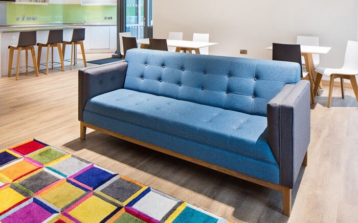 Jig Sofa 3 seater unit upholstered in vinyl with contrasting buttons
