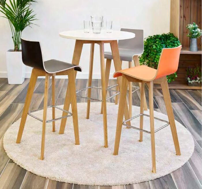 Jinx Table poseur height with white MfC top and 4 leg natural oak frame shown with 3 Jinx high chairs