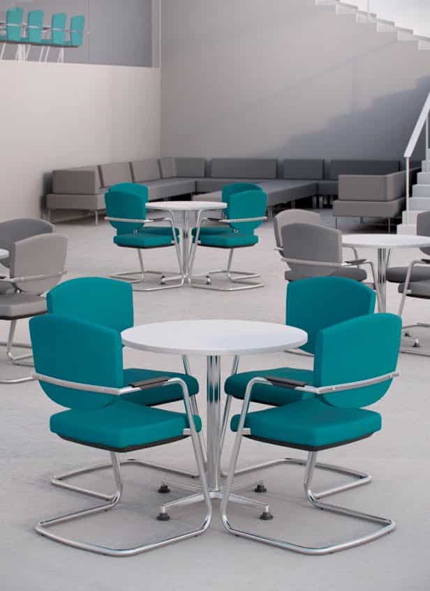 Key Meeting Chair group of chairs with cantilever frames and round tables in a breakout space