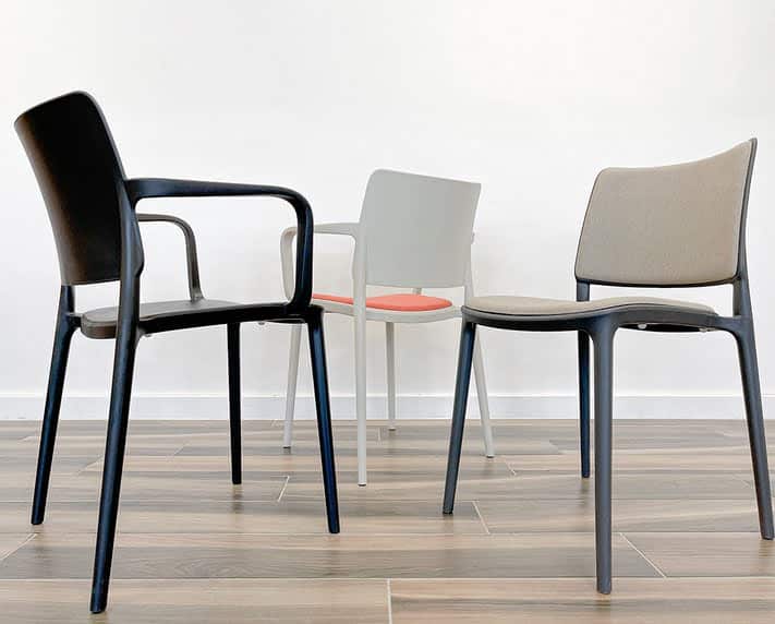 Konya Chair shown with arms and with optional upholstered back and seat pad
