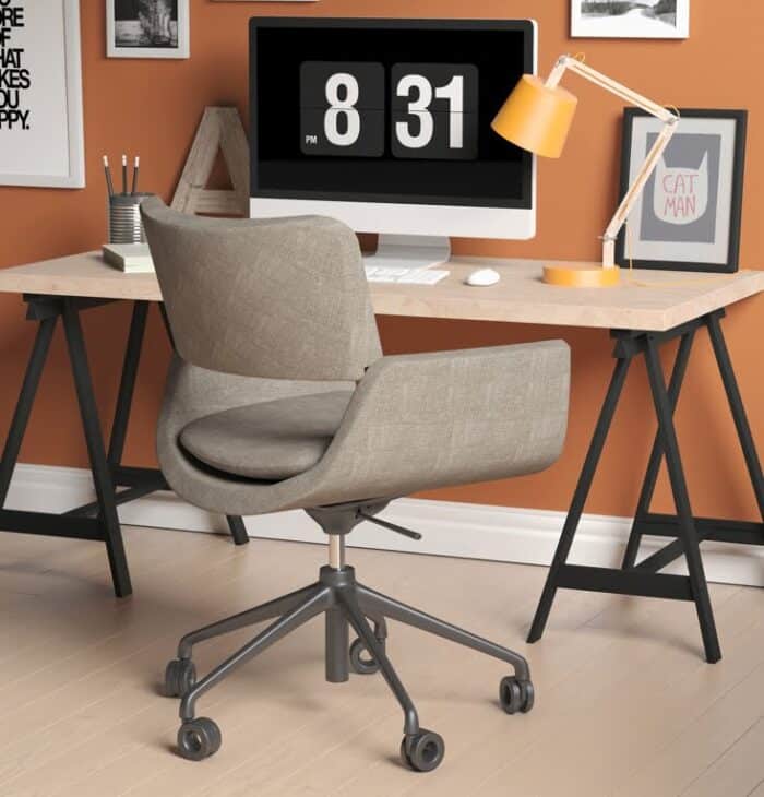Korus Soft Seating chair with 5 star base on casters shown in an office space