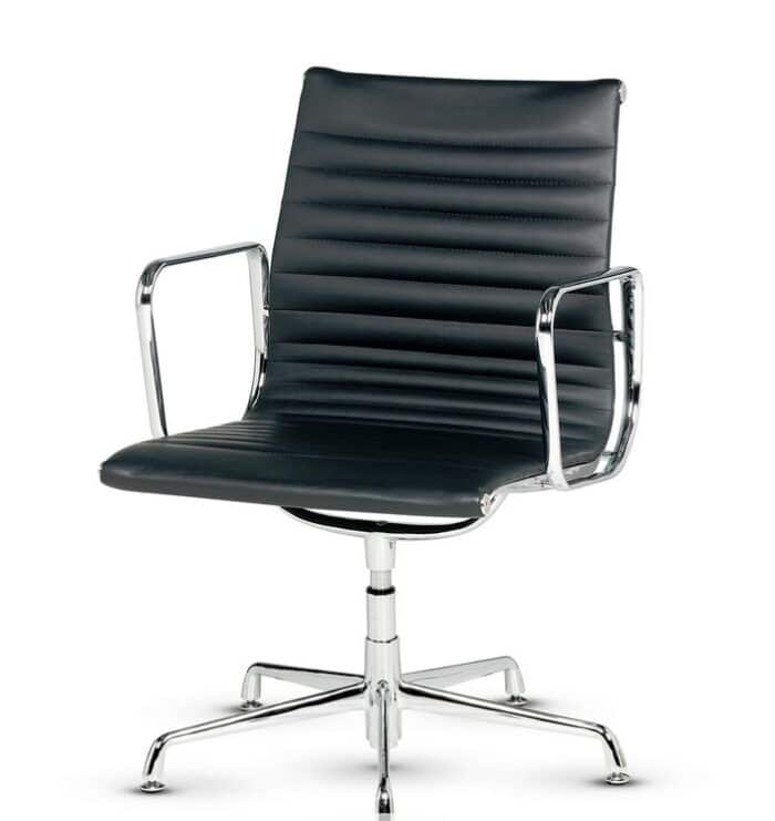 Libra Executive Chair with a low back, ribbed black leather upholstery, silver frame and glides