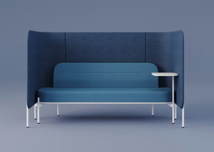 Leaf Pods sofa pod shown with blue upholstery and a laptop table in white