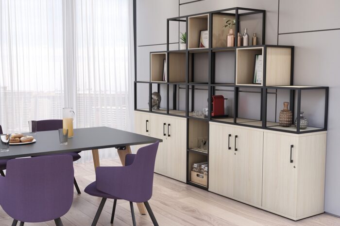 Matrix Storage stepped grid frames with base cupboards shown in a meeting space