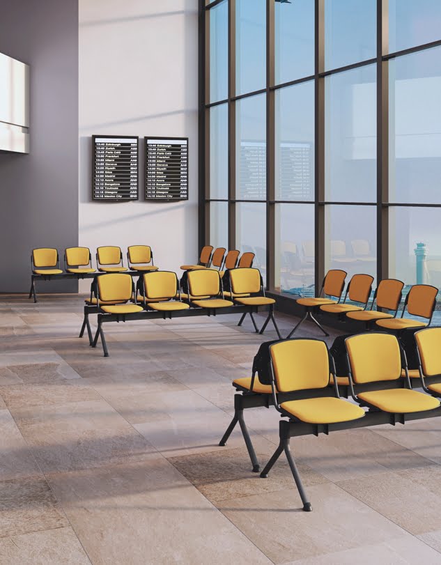 Mia Beam Seating groups of 4 person fully upholstered units in yellow fabric shown in an airport waiting area