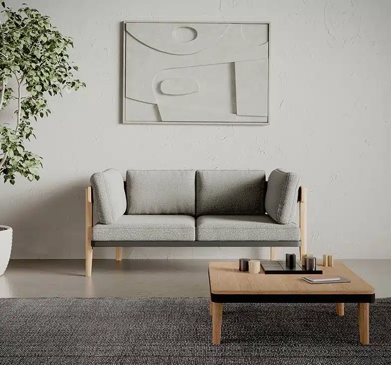 Neve Seating 2 seat sofa shown with a single free standing table in a breakout space