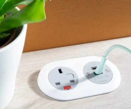 PIP2 Power Module, angled unit on a desktop, shown in white