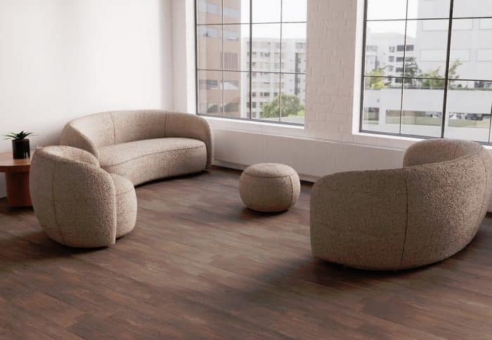 Phoebe Soft Seating - two Phoebe sofas, swivel chair and a footstool shown in a lounge area