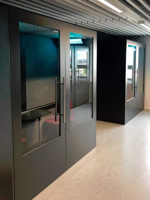 PhoneAlone Double Booth in anthracite shown in an office space