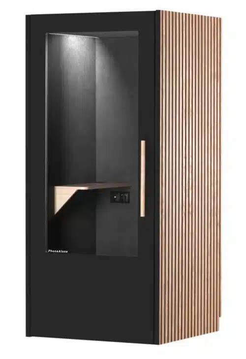 PhoneAlone Phone Booth with black door and wooden slat exterior