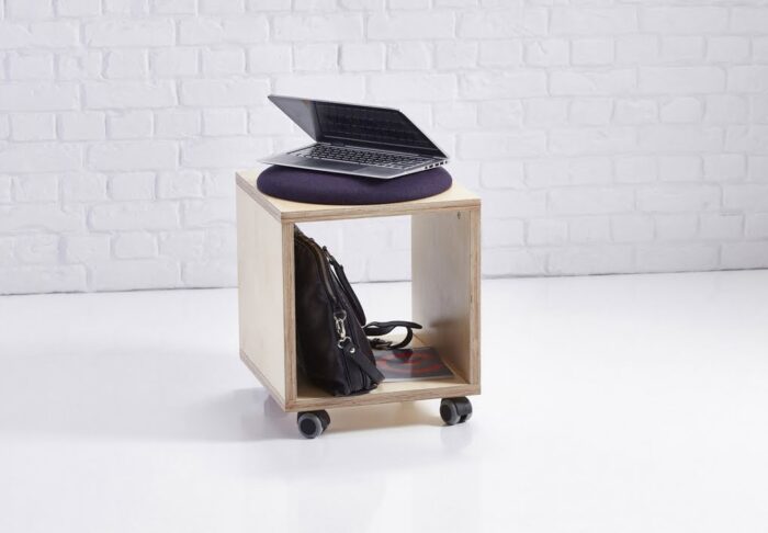 Platforms Box Stool shown with a laptop on top and storage underneath