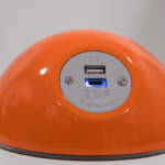 Desk Top USB Charger in a Pluto Power Module bright orange gloss finish with light grey sockets
