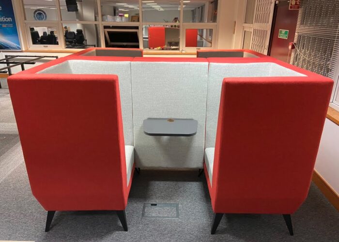 Polly Soft Seating two high back 2 seat dens shown side by side in an open plan office