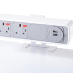 Desk Top USB Charger in a Pulse Power Module shown in white with grey fascia, with two power, 1 twin USB charger and 1 blank socket