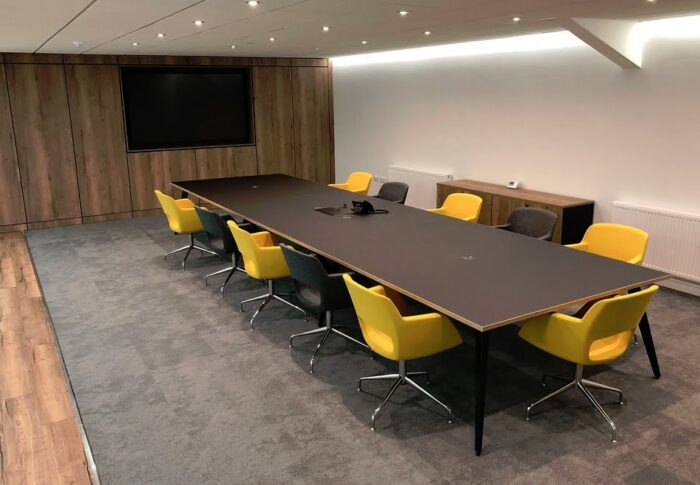 Pyramid Conference Tables shown with black steel legs and 10 Mojo chairs with raised 4 star bases on glides