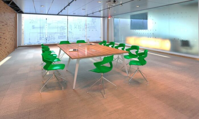 Pyramid Conference Tables with steel frame shown with 14 green Aria chairs in a meeting room