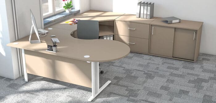 Qudos Desks And Workstations conference link workstation with storage cupboards in an office