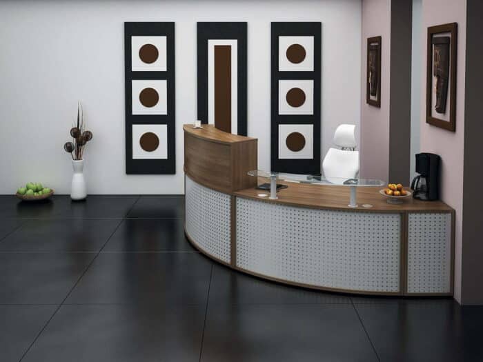Receptiv Reception Desk in walnut with perforated silver modesty panel