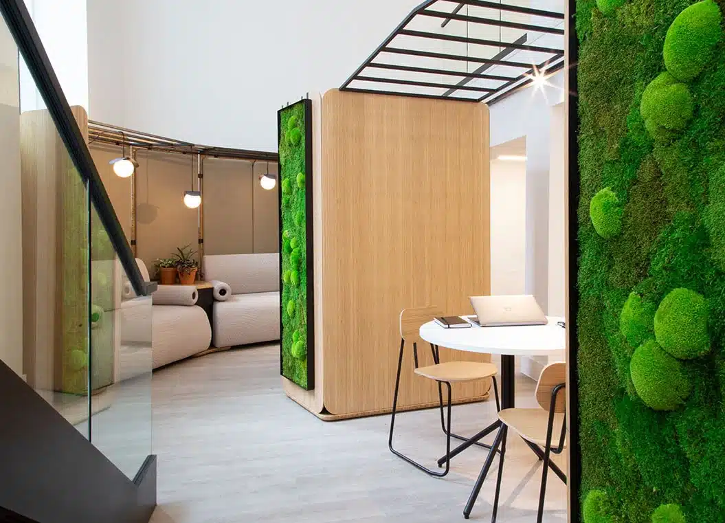 Retreat Zoning System4 seater module with a media centre module with exterior moss panel in front shown in a work space
